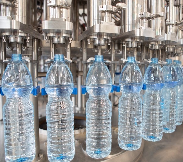 Revolutionizing the Manufacturing Industry with Water Filling Machines